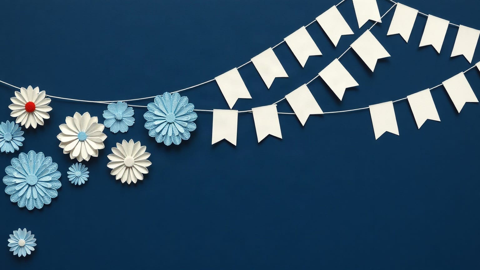 Two strings of pale bunting crossing a deep blue ground, with layered paper flowers gathered at the left end