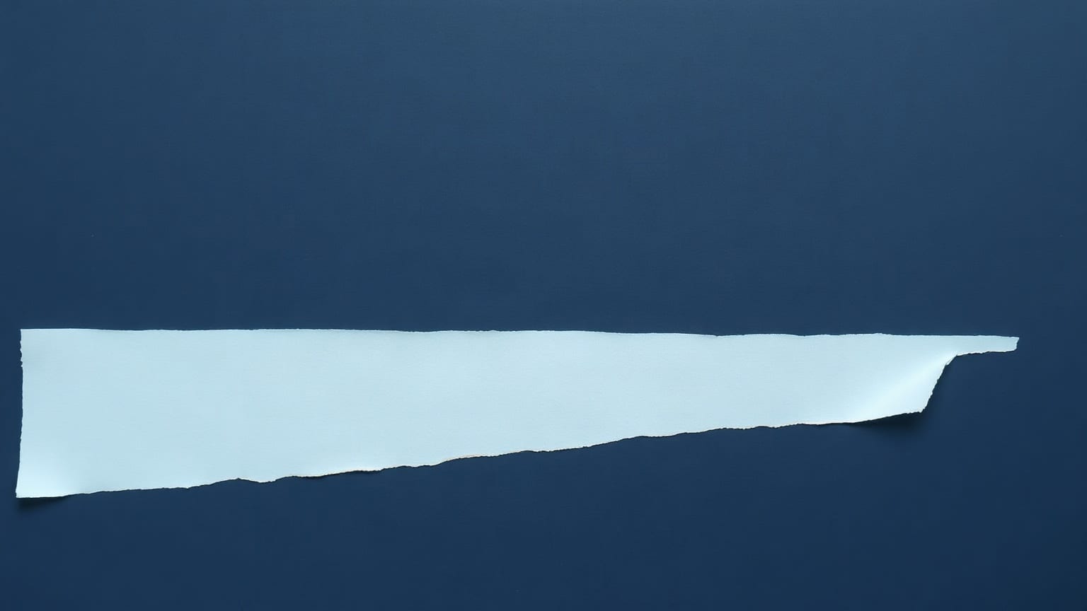 A long paper strip on a deep navy ground, solid at one end and fading to a faint outline at the other